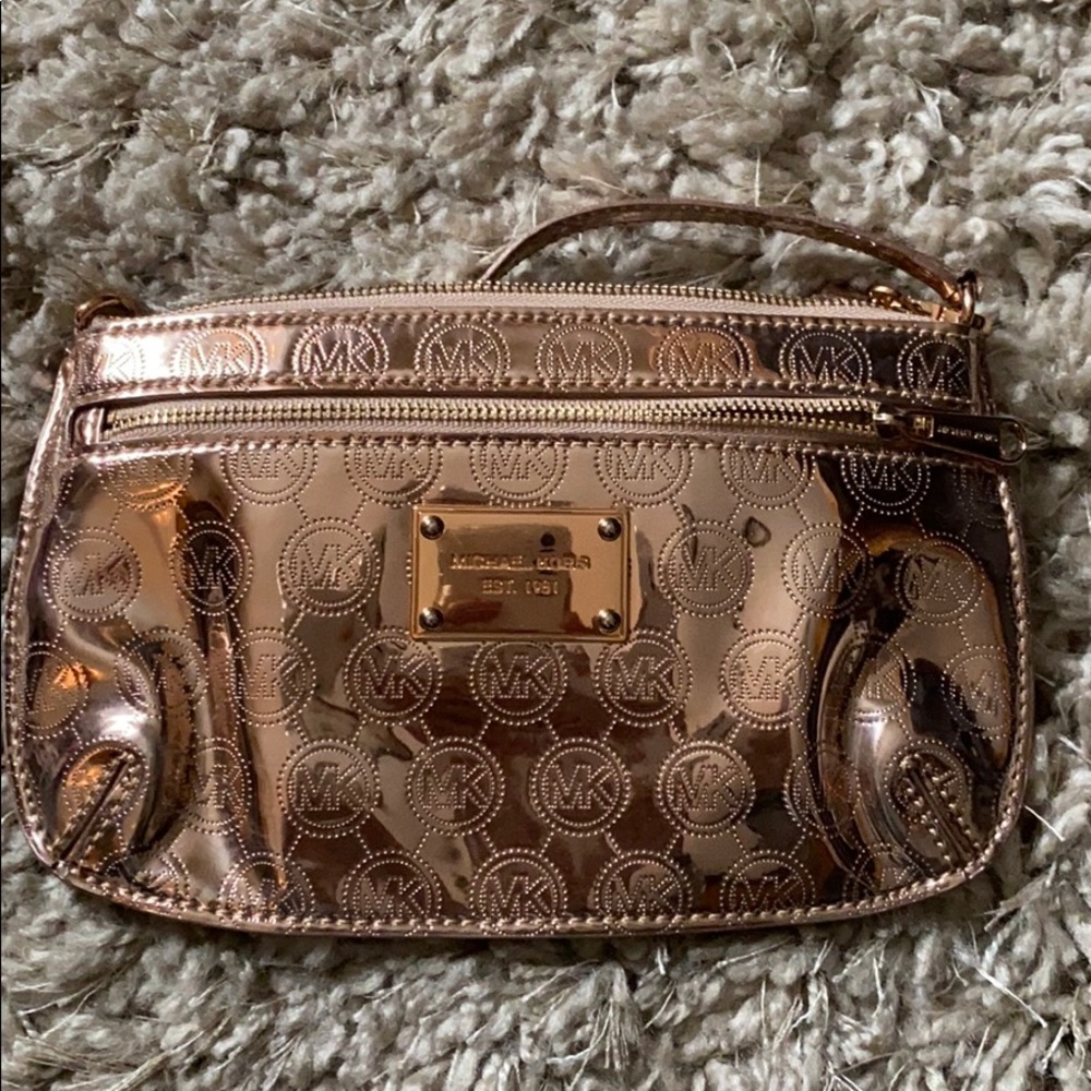 Michael Kors monogram wristlet rose gold
